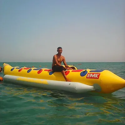 Water-Banana-Boat-Tube-Ocean-Adventure-Sport-Game-Toy-Towable-Inflatable-Banana-Boat-for-Sale.webp.e2108b61a48ac7aeb910a72063bd1015.webp